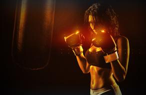 Sportive Girl in Boxing gloves