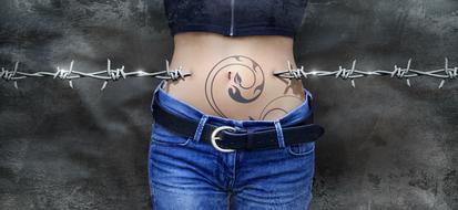 barded wire through female belly