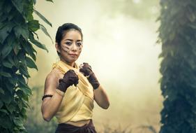 Asian woman posing like a boxer