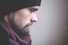Portrait of sad man in hat