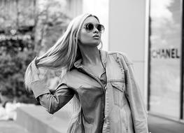 black and white, blonde in a denim shirt