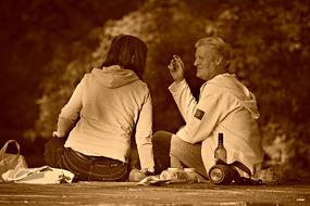 Photo of the couple on picnic, with sepia effect