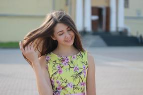 portrait of pretty Girl in Summer Dress is outdoor