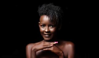 Portrait of attractive african girl topless