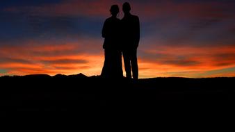 romantic wedding couple at sunset