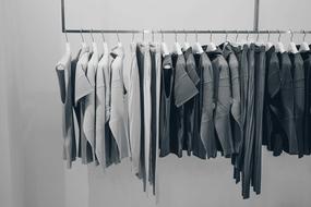 Blouses on hangers in shop