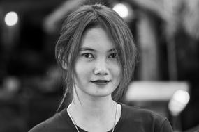 pretty Asian girl looking straight, portrait