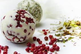 bath balls with berries and seeds