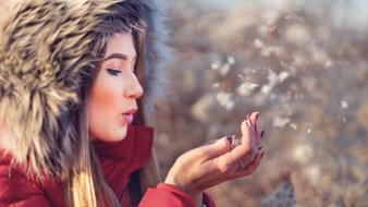 profile portrait of a beautiful girl in winter