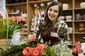 seller girl in a flower shop