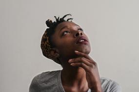 charming Woman African Looking Up