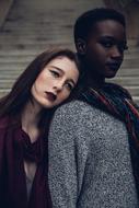 african american and white woman posing