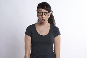 surprised woman in glasses