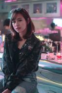 young asian Girl in black jacket