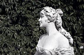 Statue of Woman Girl in garden