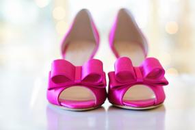 pair of Pink Shoes with Bows