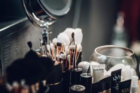 mirror and Cosmetics on table