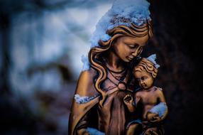 bronze sculpture of Mother Mary with child