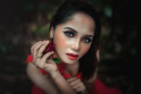 Portrait of young girl with bad makeup