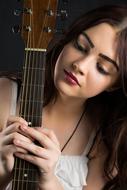 young woman with guitar