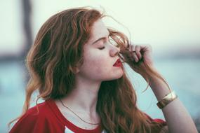 redhead young Girl with closed eyes