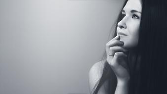 Portrait of serious young Girl looking up