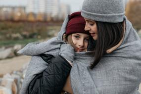 mom and daughter in nature