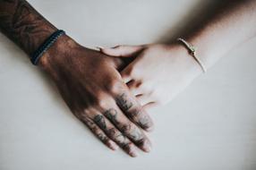 two holding hands