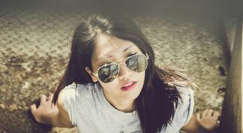 Asian woman in sunglasses