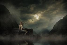 mystical picture of the Mermaid on the stone