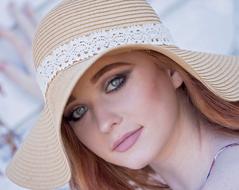 Woman in wide Fashion Hat