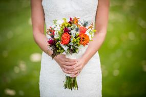 bride with a bright spring bouquet