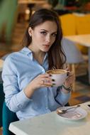 charming woman in cafe