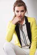 portrait of young woman in yellow blazer