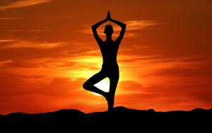 Yoga Pose Exercise at sunset