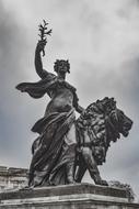 figure representing Peace in Queen Victoria Memorial at clouds, uk, england, london