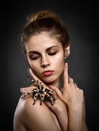 portrait of a woman with hairy tarantula