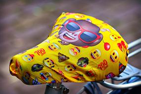 bicycle saddle with cover