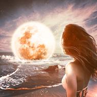 Back view of the beautiful woman with waving hair, on the beach, and bright Moon in the water