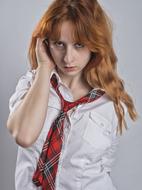 woman in a tie at a photo shoot