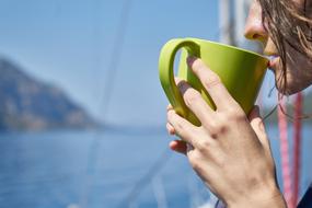 woman with green mug