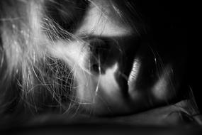 Woman slips with hair on face