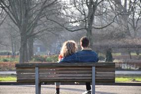 romantic couple on the park bench, amsterdam