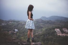 fashion model on a cliff