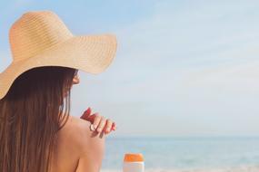 Sunbather girl on Beach Sand