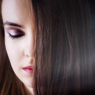 photo of a girl with closed eyes