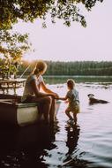 Woman and Kid on pier