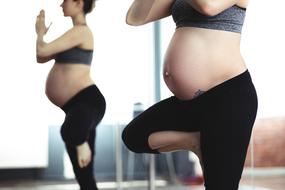 Pregnant woman doing exercises