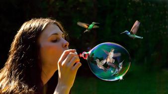 Girl Blow Bubbles and hummingbird