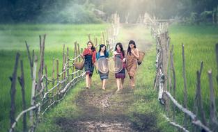photos of Vietnamese girls working on the farm and walking along the trail